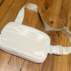Cream belt bag